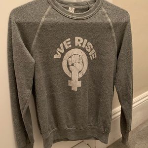 We Rise Feminist gray pullover sweatshirt